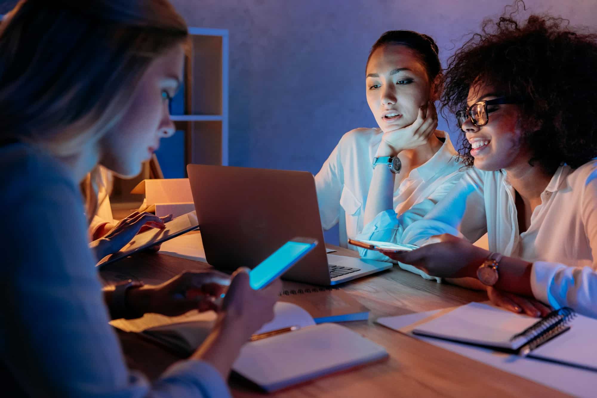 young multiethnic businesswomen working with digital devices at home office 1
